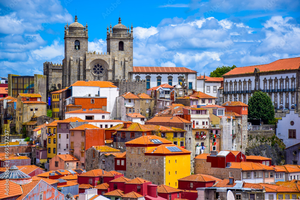 View over the old town of Porto, Portugal with the cathedral and colorful buildings - obrazy, fototapety, plakaty 