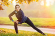 © Rido - Woman doing stretching exercise