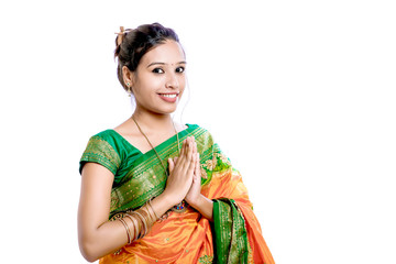 Happy young beautiful traditional Indian woman in traditional saree