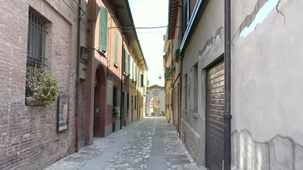 Poster - narrow street of the medieval village of Dozza, a small gem among the architectural wonders of Italy