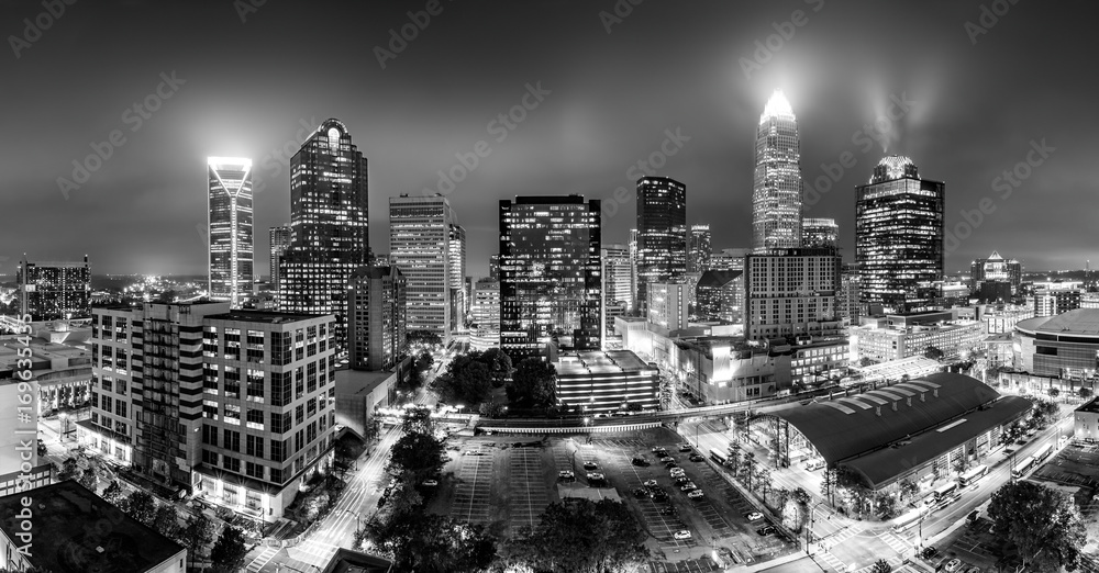 Black and white, aerial view of Charlotte, NC skyline on a foggy night. Charlotte is the largest city in the state of North Carolina and the 17th-largest city in the United States - obrazy, fototapety, plakaty 