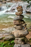 Fototapeta Desenie - Stones arranged zen-like by the river
