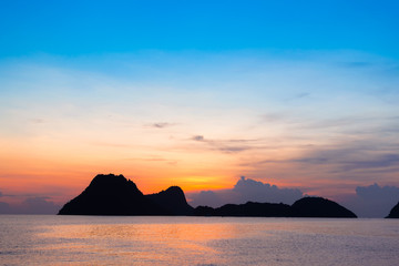 Wall Mural - bright colors at dawn on the beach at sunrise in the gulf of thailand.