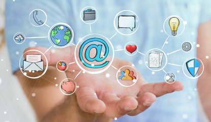 Businessman holding multimedia hand-drawn interface