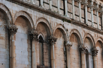 Wall Mural - Details of the facade of Church San Michele in Foro (Saint Michael) in Lucca, Italy.