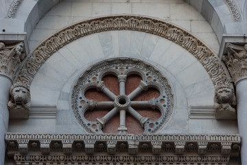 Wall Mural - Details of the facade of Church San Michele in Foro (Saint Michael) in Lucca, Italy.