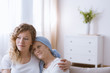 © Photographee.eu - Hopeful cancer woman hugging daughter