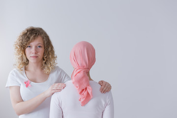 Wall Mural - Daughter with ribbon supporting mother