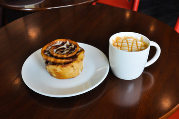 Wall Mural - warm cup of coffee in cofee shop