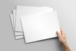 © PrimeMockup - Blank A4 photorealistic landscape brochure mockup on light grey background.