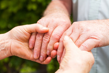 Sticker - Elderly couple holding hands