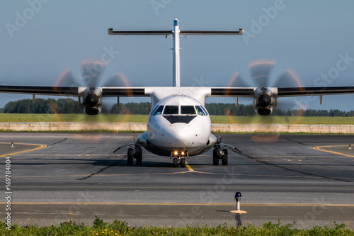 Fotografie, Obraz Taxiing turboprop airplane from the runway