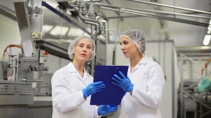 Wall Mural - women technologists at ice cream factory