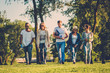 © Nejron Photo - Multi-ethnic group of friends in a park