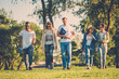 © Nejron Photo - Multi-ethnic group of friends in a park