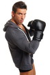 © petrdlouhy - Muscular man with boxer gloves on white background