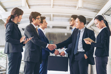 Wall Mural - Action of business people meeting agreement