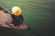 A Woman Rowing Boat In Cai Rang