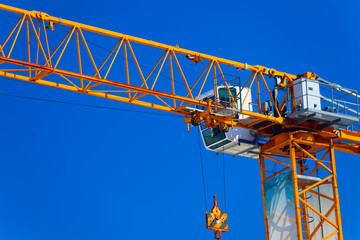 Part construction crane with blue sky background