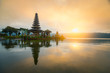 © sakarin14 - Pura Ulun Danu Bratan temple in sunrise sky at Bali island, The most famous tourist attraction in Indonesia.