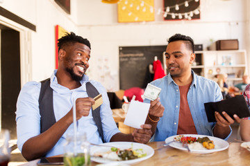 Sticker - happy friends with money paying bill at restaurant