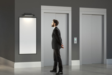 Poster - Thinking man in room with lift