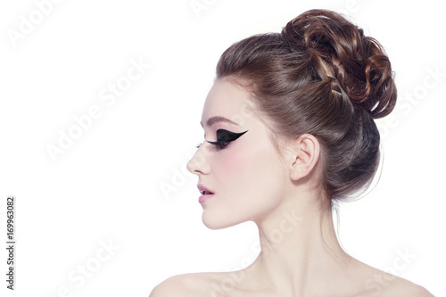 Profile Portrait Of Young Slim Beautiful Girl With Hair Bun And