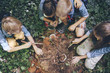 © Lumina/Stocksy - Children Scouts Observing Mushrooms