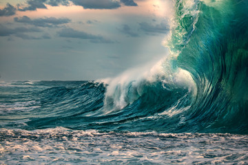 Wall Mural - huge ocean wave during storm. sea water background in rough conditions