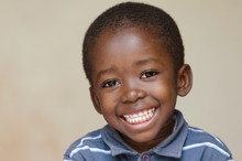 Handsome Little African Boy Portrait Smiling With Toothy Smile