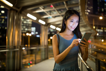 Canvas Print - Woman use of mobile phone at night