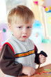 Little boy playing and learning in preschool