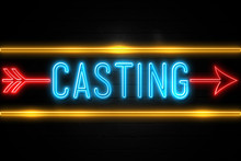 Casting  - Fluorescent Neon Sign On Brickwall Front View