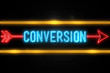 Conversion  - fluorescent Neon Sign on brickwall Front view