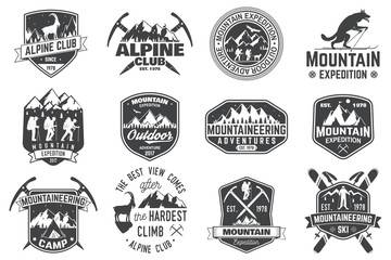 Wall Mural - vintage typography design with mountaineers and mountain silhouette.