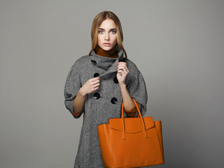 Wall Mural - beautiful woman with handbag