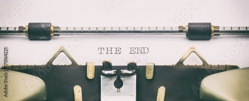 Cuadros en Lienzo The End words in capital letters on white sheet