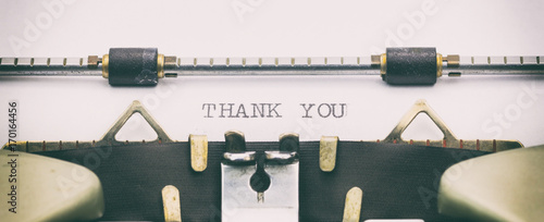 Fotografía Thank you words in capital letters on white sheet