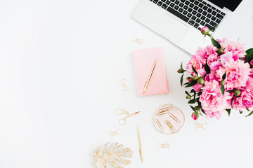 Wall Mural - Flat lay home office desk. Woman workspace with laptop, pink peonies bouquet. Top view feminine background.