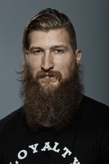 Wall Mural - Portrait of a serious young bearded man