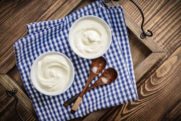 Canvas Print - Greek yogurt in bowls