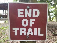 Brown And Red End Of Trail Sign
