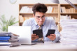 © Elnur - Funny accountant bookkeeper working in the office