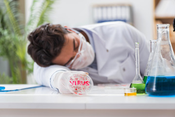 Male doctor working in the lab on virus vaccine