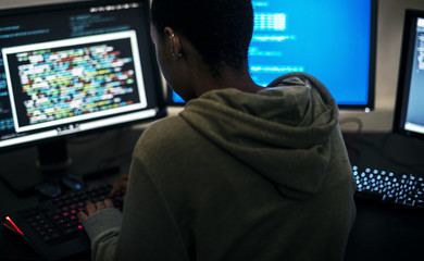 Wall Mural - hacker man working on computer