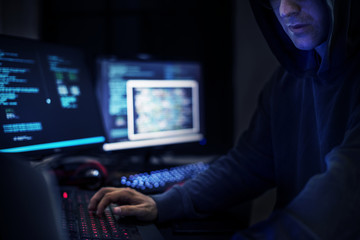 Wall Mural - hacker man working on computer