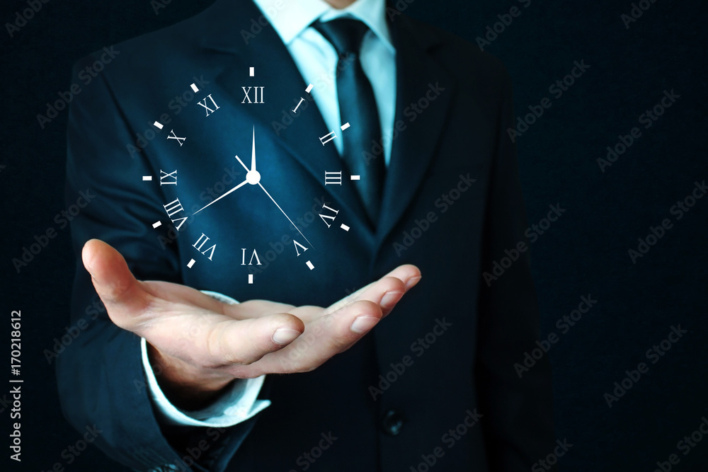 Businessman holding clock. Business time management . - obrazy, fototapety, plakaty 