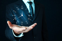 Businessman Holding Clock. Business Time Management .
