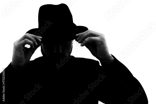 Fotografía Hidden face in the shadow.male person silhouette
