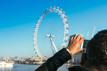 Taking Picture Of The London Eye